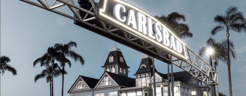 The Carlsbad welcome sign arching over Carlsbad Boulevard in downtown Carlsbad, California